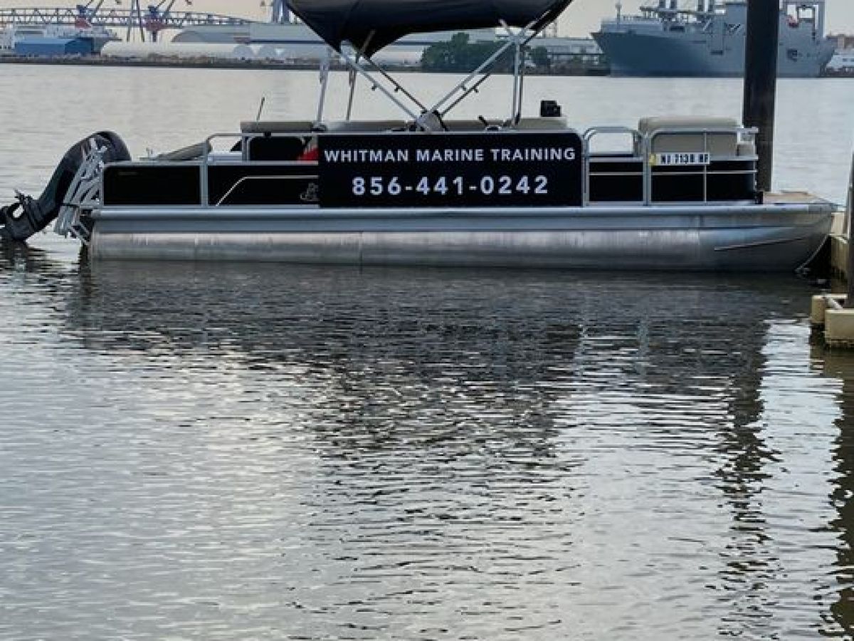 a boat parked next to a body of water