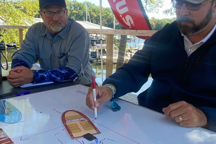 a group of people sitting at a table
